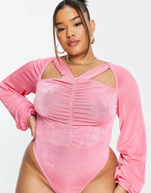 In The Style Plus exclusive cut out ruched volume sleeve bodysuit in pink