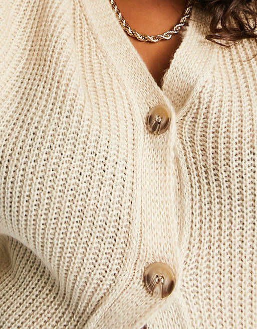 In The Style Plus exclusive knitted cable knit cardigan in oatmeal | ASOS