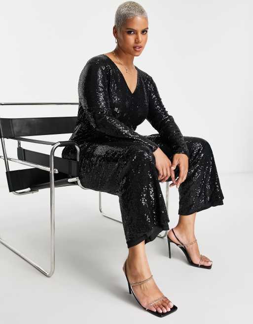 In The Style Plus exclusive sequin plunge front wide leg jumpsuit in black