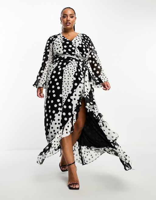 In The Style Plus exclusive volume sleeve wrap maxi dress in mixed spot print