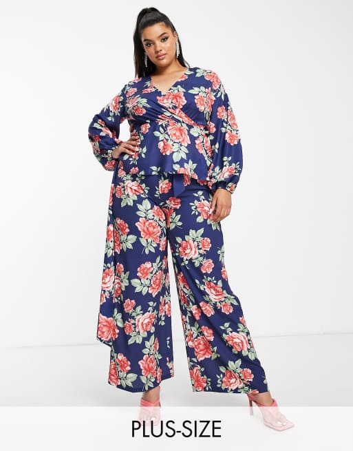 In The Style Plus - Jess Millichamp - Broek met wijde pijpen, taille met plooirand en bloemenprint in marineblauw