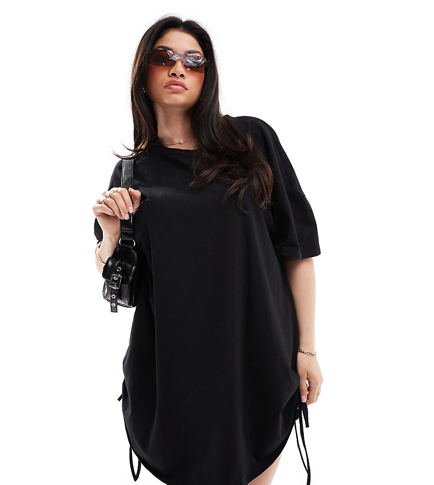 In The Style Plus ruched tie side oversized mini t-shirt dress in black