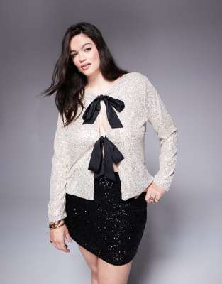 In The Style Plus sequin top with contrast bow