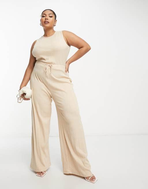 In The Style Plus - Tuta jumpsuit a fondo super ampio color pietra