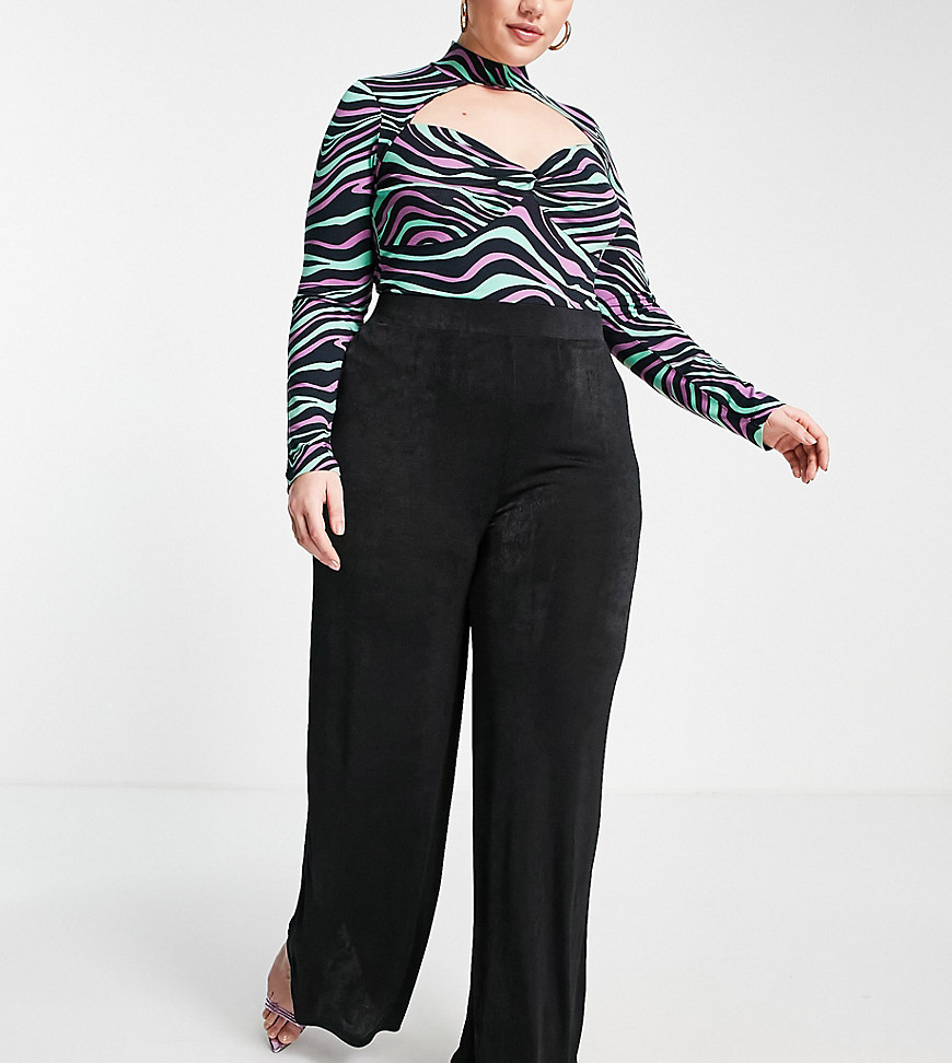 Plus-size trousers by In The Style Easily dressed up or down High rise Elasticated waist Wide leg