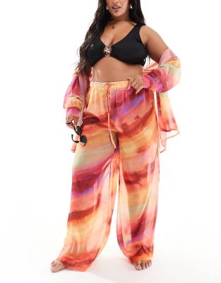 In The Style Plus In The Style Plus x Perrie Sian exclusive semi sheer wide leg beach trousers co-ord in orange ombre