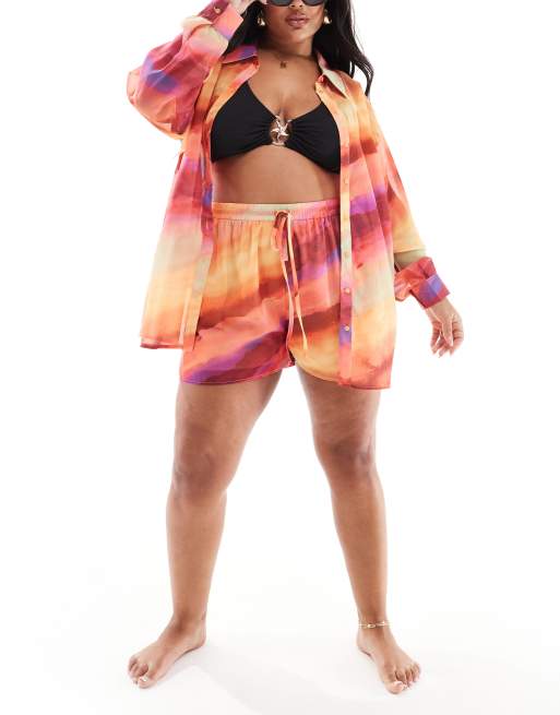 In The Style Plus x Perrie Sian – Halbtransparente Strand-Shorts in Orange mit Farbverlauf