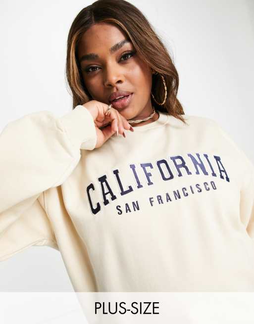 https://images.asos-media.com/products/in-the-style-plus-x-perrie-sian-slogan-sweatshirt-top-in-cream-part-of-a-set/203636855-1-cream?$n_640w$&wid=513&fit=constrain