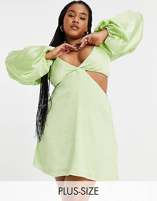 In The Style Plus x Yasmin Chanel satin cut out volume sleeve skater dress in green