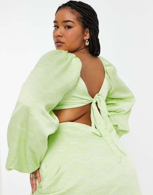 In The Style Plus x Yasmin Chanel satin cut out volume sleeve skater dress  in green | ASOS