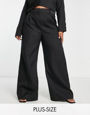 In The Style Plus x Yasmin Devonport exclusive relaxed tailored trouser co-ord in black