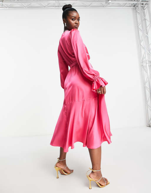 In The Style satin wrap detail volume sleeve midi dress with asymmetric  ruffle hem in pink