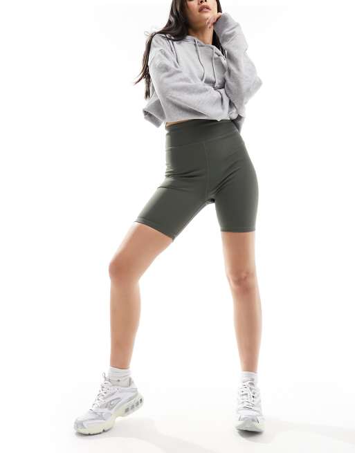 In The Style sculpt and control legging shorts in khaki