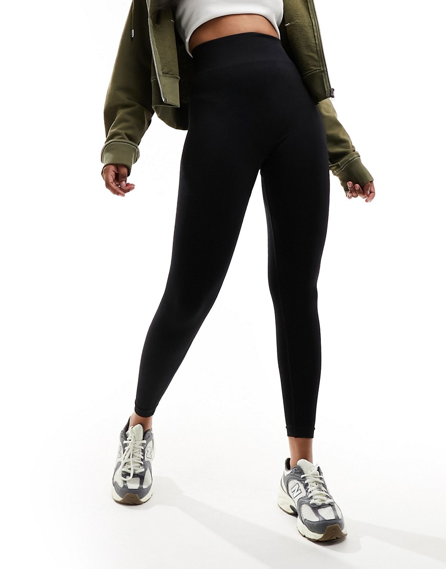 In The Style sculpted high waisted ribbed leggings in black