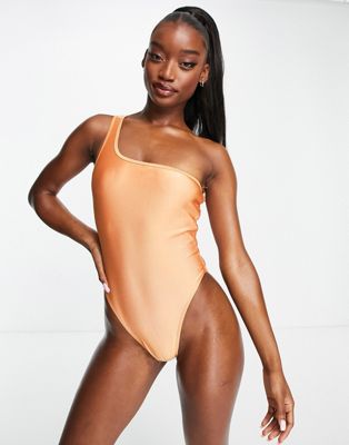 In The Style Syd & Elle high shine one shoulder swimsuit in orange
