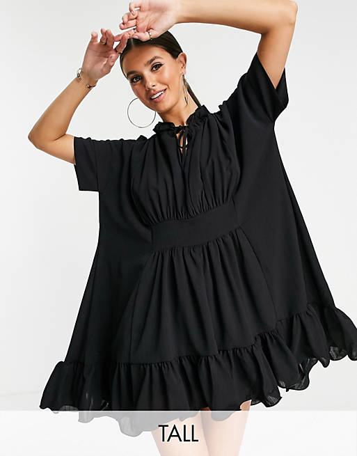 In The Style Tall x Lorna Luxe cape step hem ruffle mini dress in black