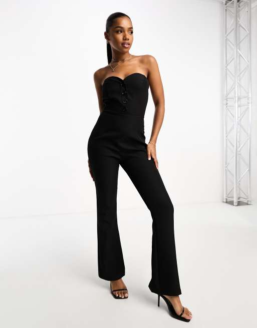 In The Style – Trägerloser, schmal geschnittener Jumpsuit in Schwarz mit Knopfdetail und weitem Bein