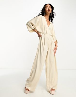 In The Style v neck batwing sleeve wide leg jumpsuit in stone - ASOS Price Checker