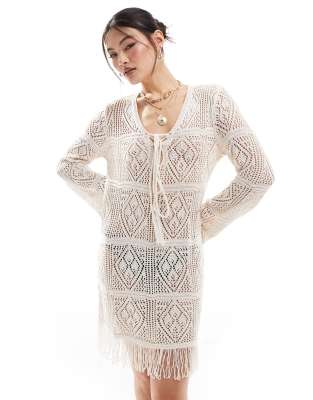 In The Style In The Style v neck tie detail tassel hem crochet mini beach dress in beige-White