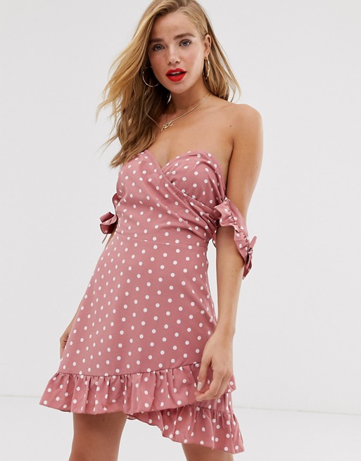 In The Style x Dani Dyer off shoulder asymmetric mini dress in pink polka print