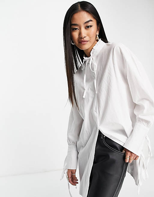Tops Shirts & Blouses/In The Style x Dani Dyer ruffle collar tie sleeve shirt in white 