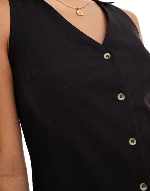 In The Style x Georgia Louise linen look sleeveless button through mini  dress in black | ASOS