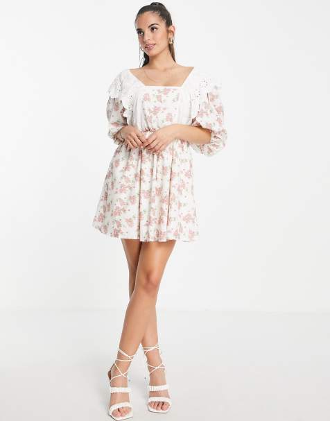 In The Style x Lorna Luxe exclusive trim bib detail mini smock dress in rosebud floral print - view 1
