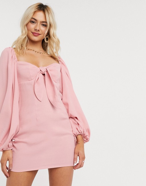 In The Style x Lorna Luxe puff sleeve off shoulder tie front mini dress in pink
