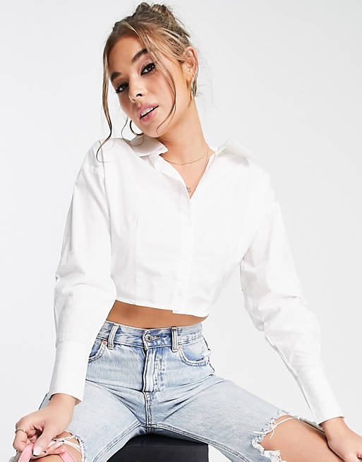 Women Shirts & Blouses/In The Style x Olivia Bowen curved hem shirt in white 