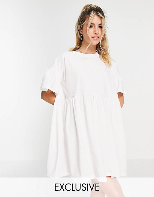 In The Style x Olivia Bowen exclusive smock dress with fluted sleeves in white