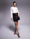 [In The Style] In The Style x Perrie Sian boucle diamante bow detail wrap mini skirt in black 6 BLACK