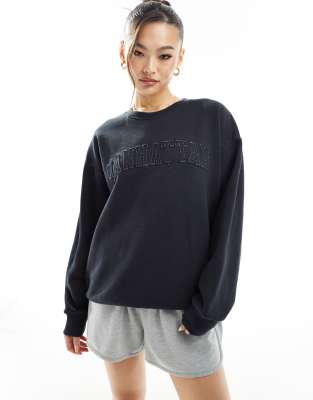 In The Style In The Style x Perrie Sian distressed wash Manhattan logo sweatshirt in charcoal grey