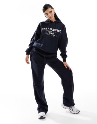 In The Style x Perrie Sian - Jogginghose in Marineblau mit weitem Bein, Kombiteil