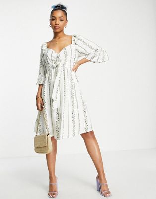 In The Style x Stacey Solomon sweetheart neck puff sleeve mini skater dress in cream floral print