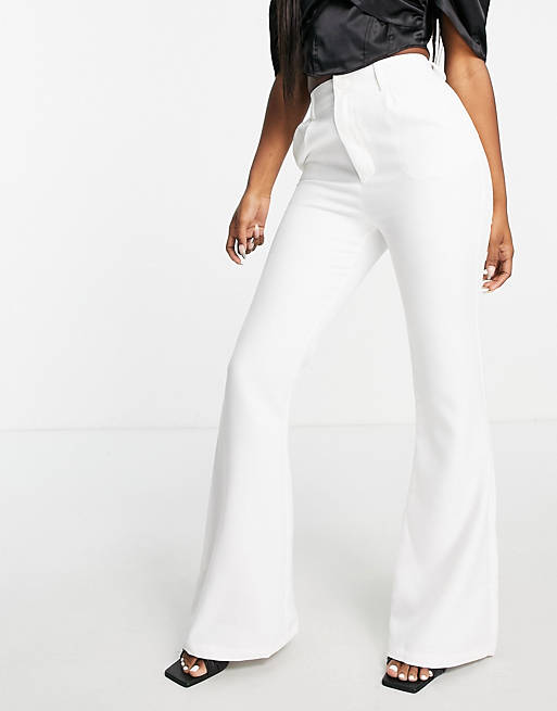 In The Style x Yasmin Chanel  flare trouser co ord in white