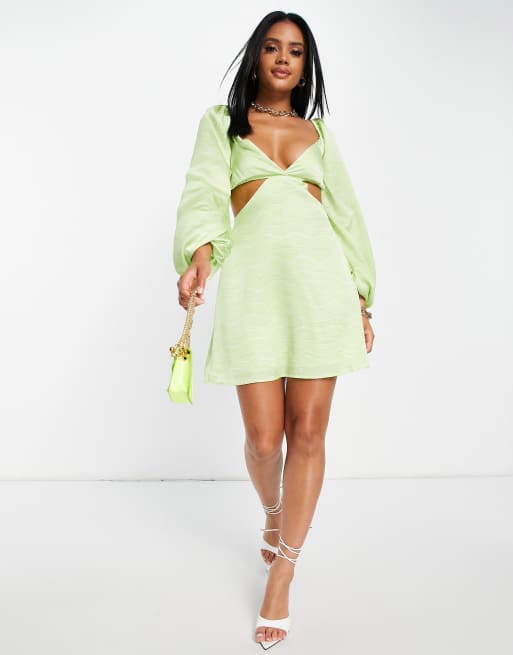 In The Style x Yasmin Chanel satin cut out volume sleeve skater dress in  green