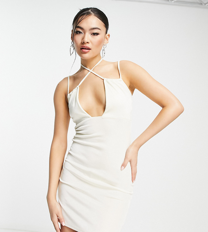 In The Style x Yasmin Devonport exclusive mini cut out detail mini body-conscious dress in cream-White