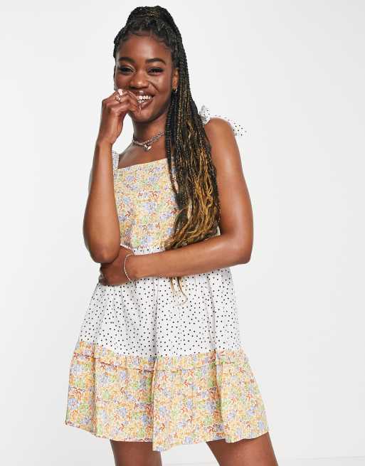 Influence bow tie strap cami mini dress in mixed floral ASOS