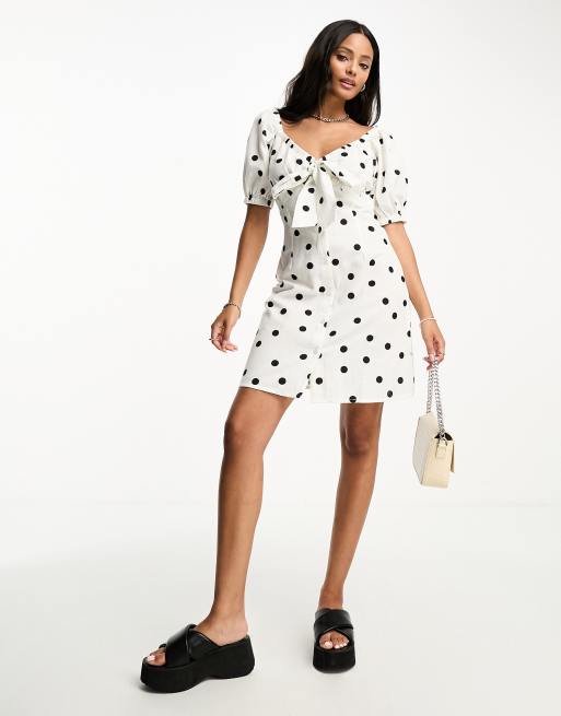 Influence cotton tie front mini dress in polka dot | ASOS