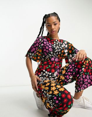 Influence flutter sleeve jumpsuit in mixed floral print