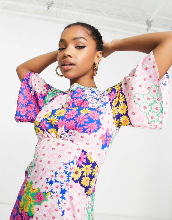https://images.asos-media.com/products/influence-flutter-sleeve-midi-tea-dress-in-blue-floral-print/203842951-4?$n_550w$&wid=550&fit=constrain