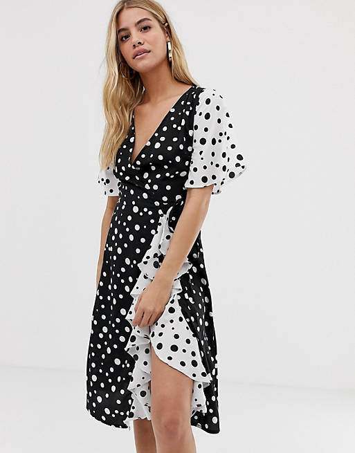 Influence frill skirt detail midi dress with wrap front in mix and match polka dot print