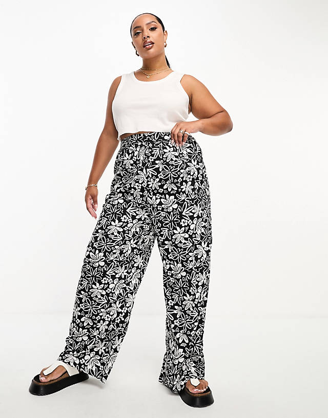 Influence Plus - wide leg trousers in monochrome floral print