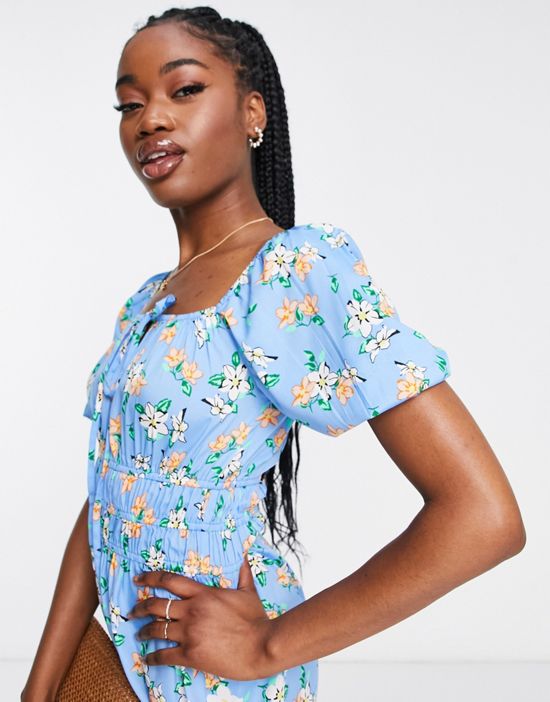 https://images.asos-media.com/products/influence-puff-sleeve-romper-in-blue-floral-print/202377397-3?$n_550w$&wid=550&fit=constrain