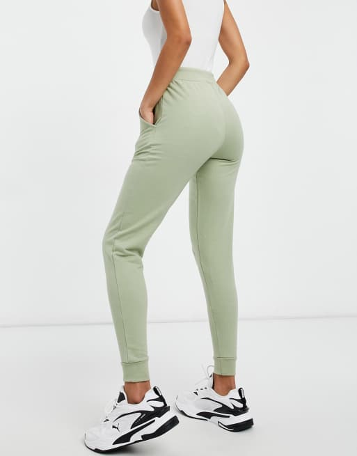 Nike skinny joggers shop in sage green