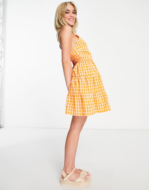 Influence tiered mini cami dress with bow back in orange gingham