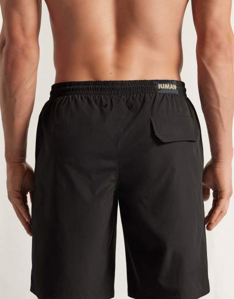 Intimissimi Long solid-colour swim trunks in black - view 1