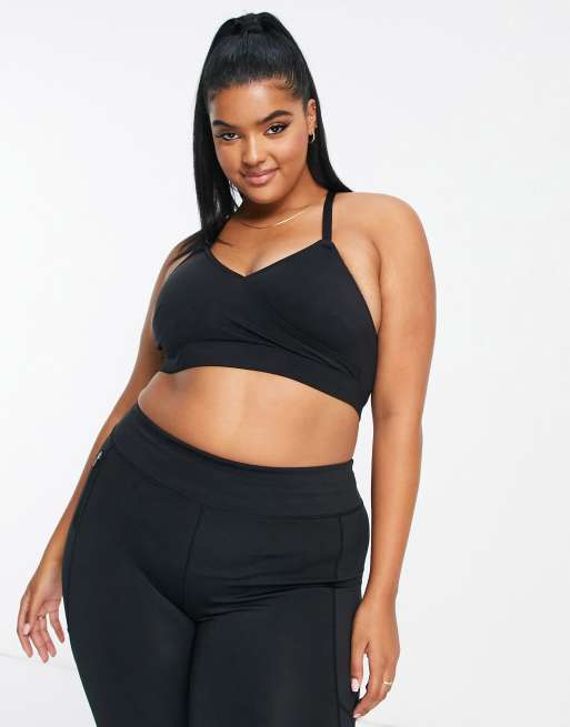 https://images.asos-media.com/products/ivory-rose-curve-wrap-front-sports-bra-in-black/202818440-1-black?$n_640w$&wid=513&fit=constrain