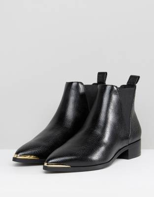 black pointed flat boots