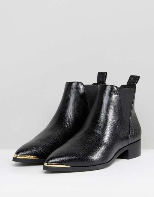 Black flat 2024 pointed ankle boots